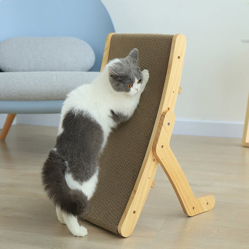Cat scratching an upright corrugated cat scratcher in a wooden frame