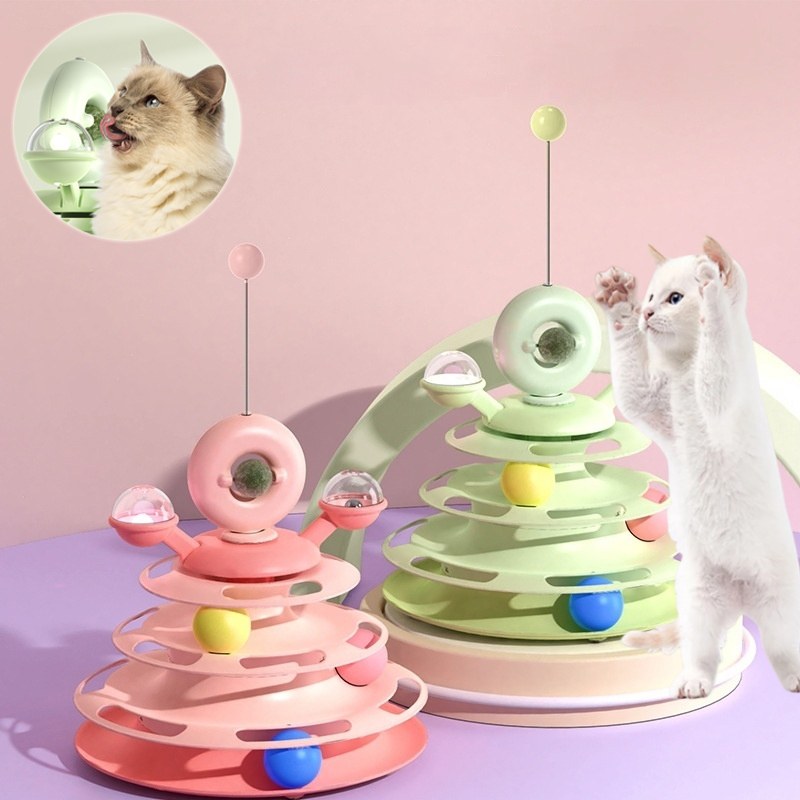 Cat playing with a 4-level cat track tower toy